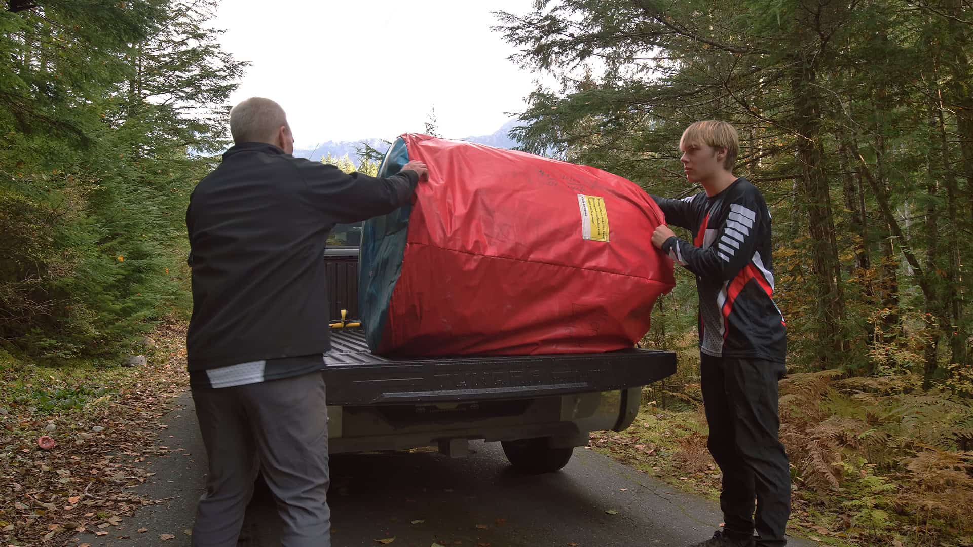 Team unloading Gravity Stunt airbag from truck.
